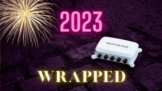 A Reporter on a dark background with the text '2023 wrapped' and fireworks