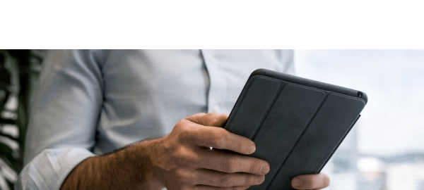 man holding tablet