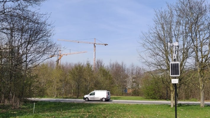 weather station next to cranes